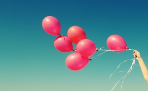 red balloons on the background of blue sky