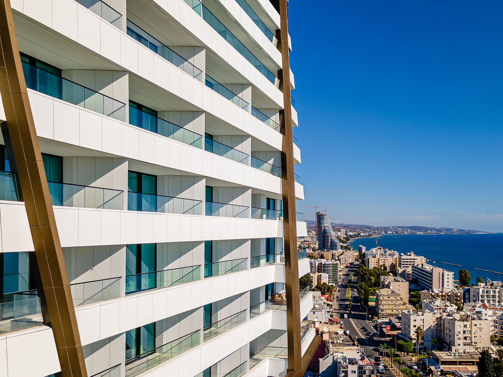 The Icon, Limassol by Imperio, close up of the building and the city of Limassol