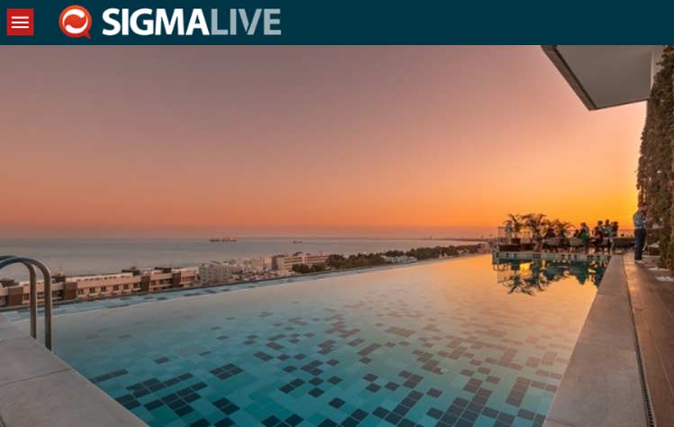 icon limassol, during sunest, high rise building, mediterranean sea